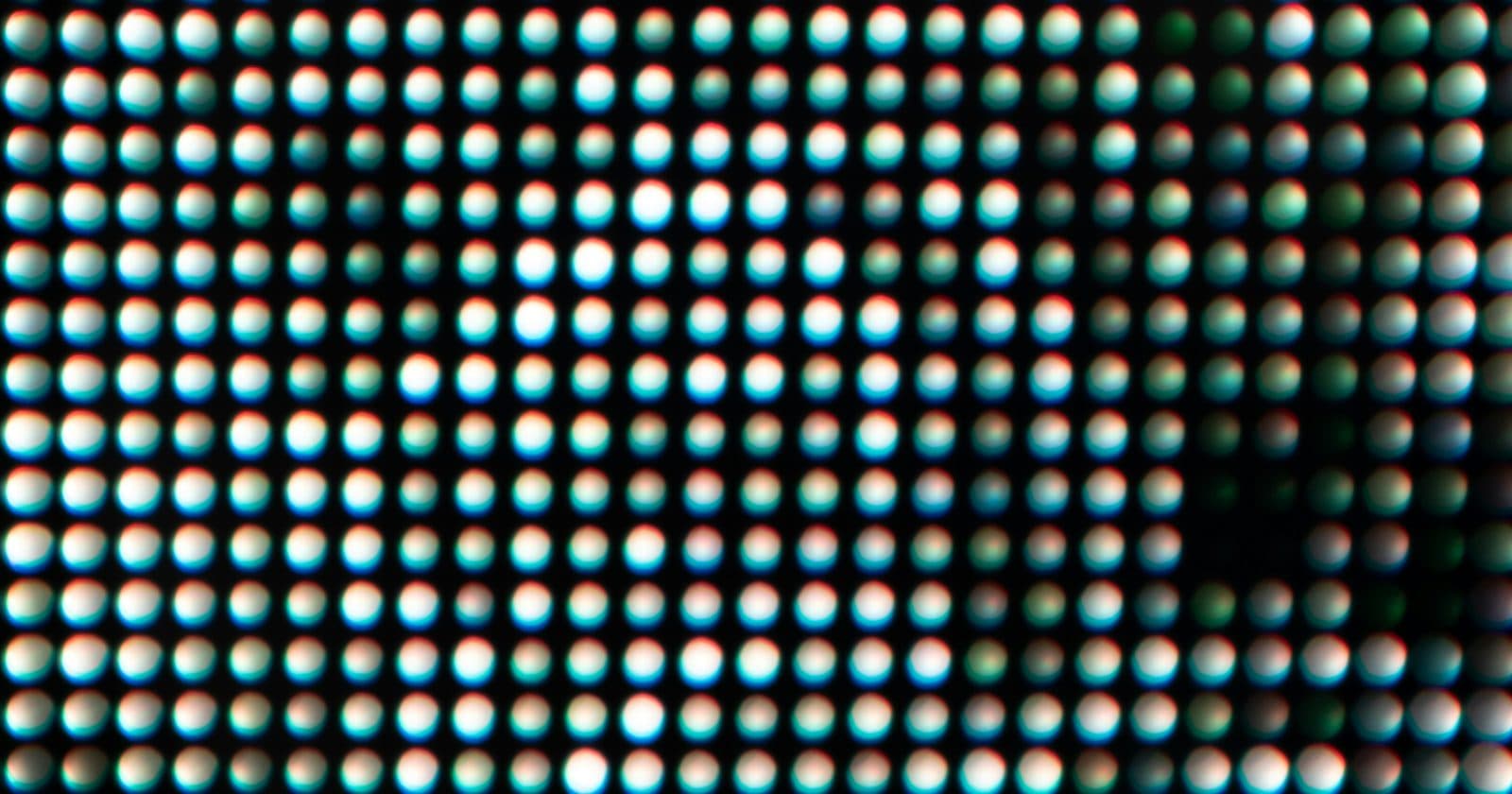 Close-up of an LED panel showing individual pixel dots and the gaps between them